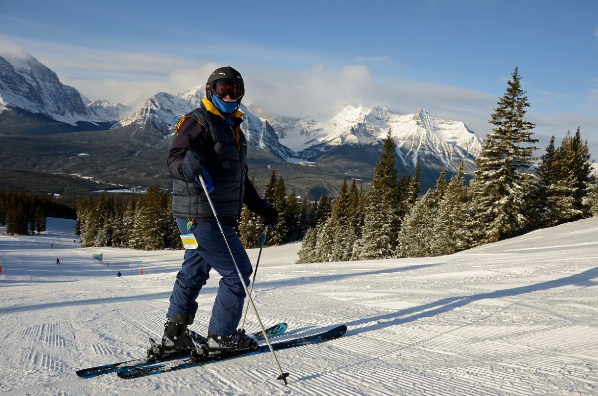 06 Charlotte Ryan Skiing Just Below Glacier Chairlift With Mount Temple and Mount Victoria Behind